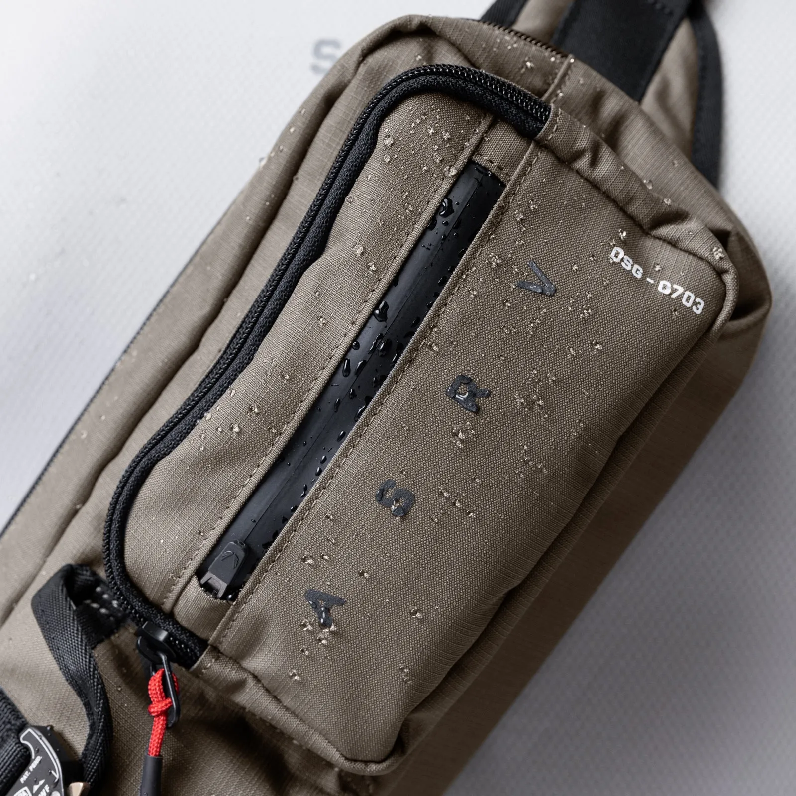 0703. Cordura® Tech Crossbody Pack - Deep Taupe