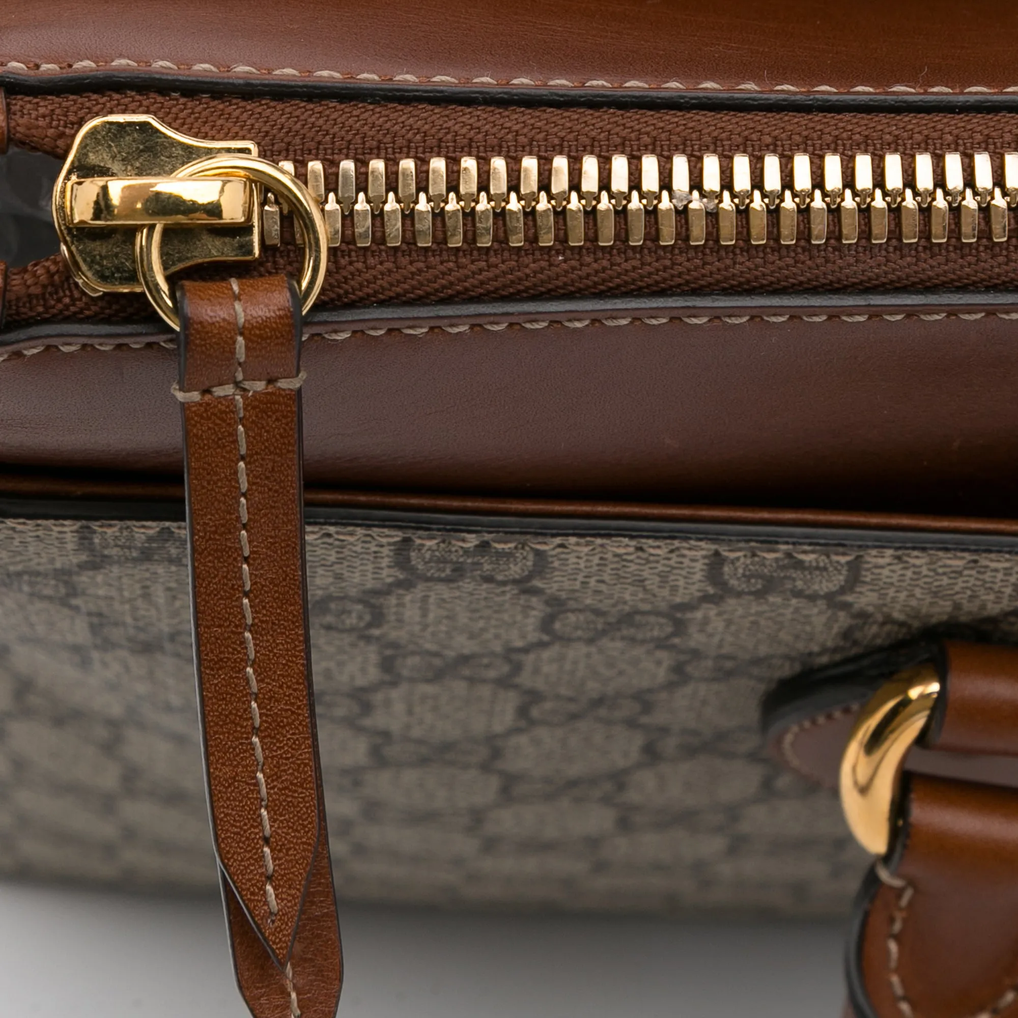 Gucci Linea A Zip Brown GG Supreme Canvas