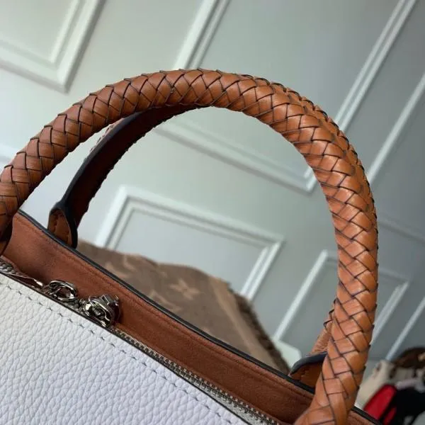 Haumea Mahina Perforated Leather Top Handle Bag M55553 White 2019 Collection