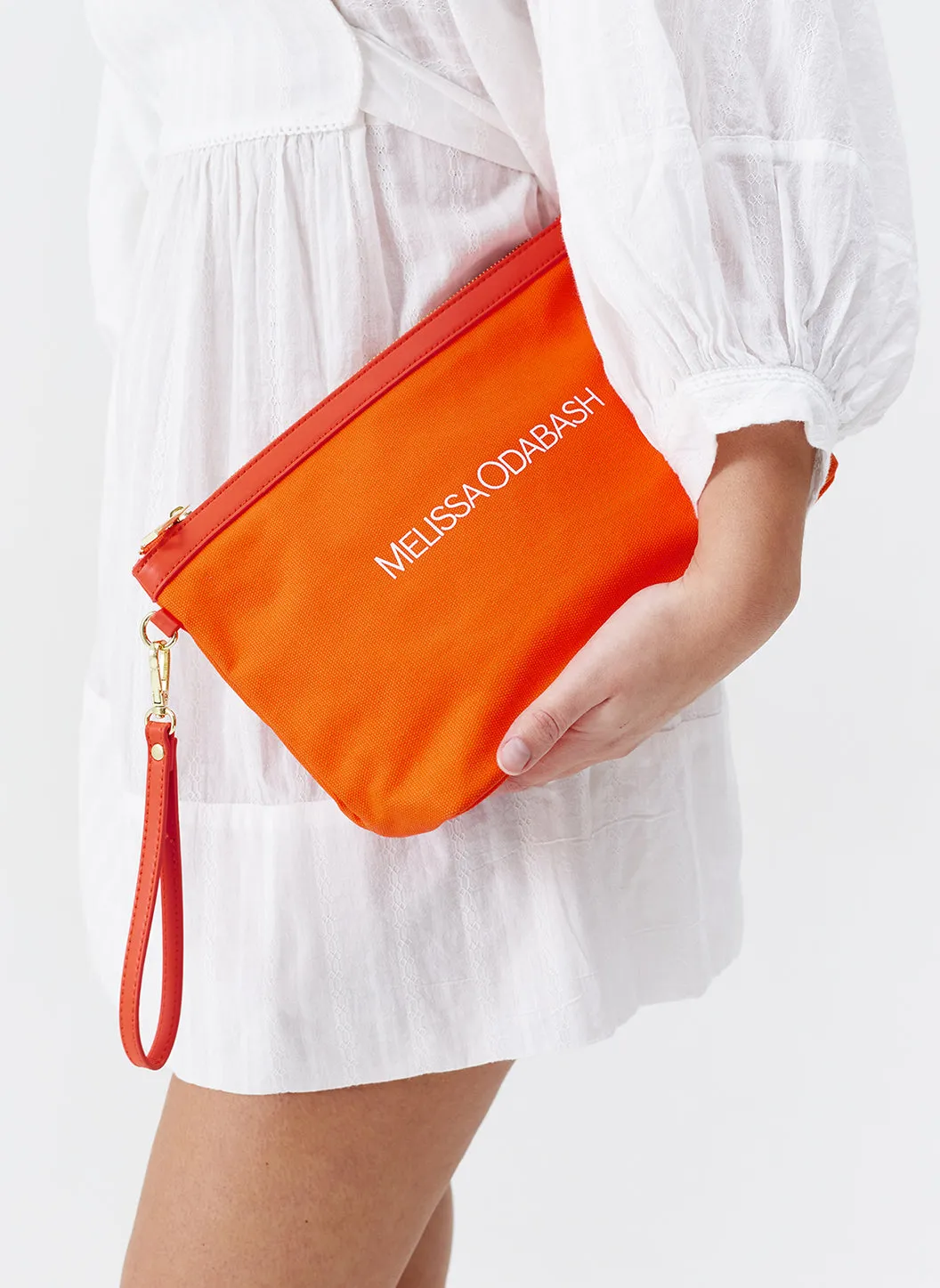 Milos Orange Clutch